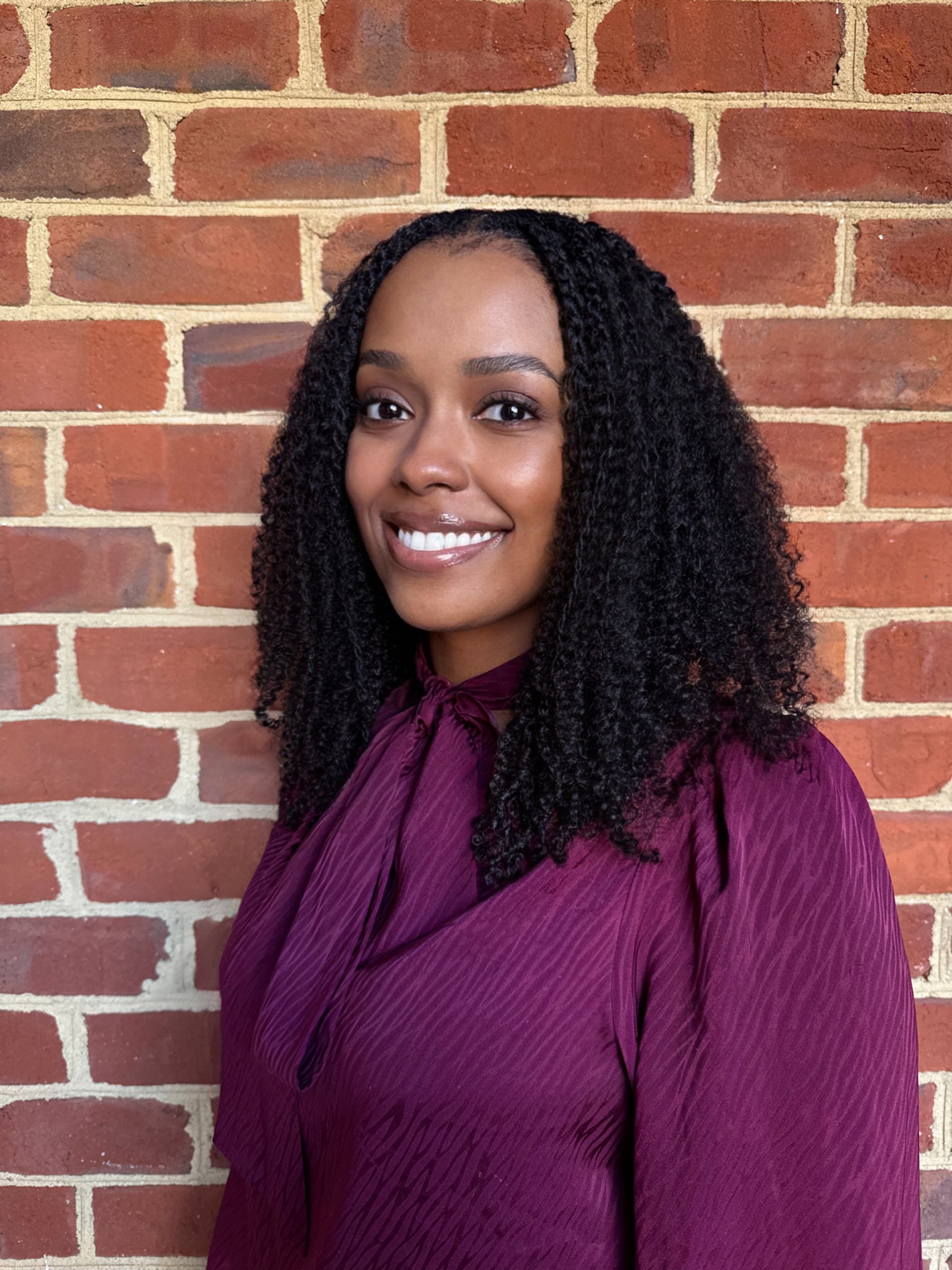 Headshot of Nia Harris